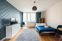 Posteľ alebo postele v izbe v ubytovaní Praga-Południe Blue Studio