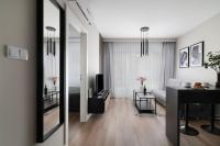 Televízia a/alebo spoločenská miestnosť v ubytovaní Easy Rent Apartments - WETTERA II