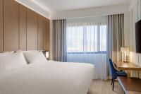 Katil atau katil-katil dalam bilik di AC Hotel by Marriott Saint-Julien-en-Genevois