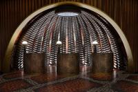 a room with a stage with a wall with a bunch of pipes at W Dubai - Mina Seyahi in Dubai