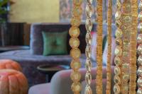 a close up of a gold chain on a chair at W Dubai - Mina Seyahi in Dubai