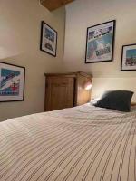 Łóżko lub łóżka w pokoju w obiekcie Courchevel 1650 appartement cosy 6 personnes