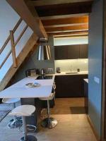Kuchnia lub aneks kuchenny w obiekcie Courchevel 1650 appartement cosy 6 personnes