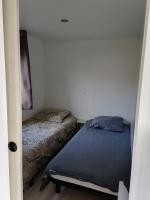 Cama ou camas em um quarto em trigano sublima