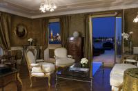 a living room with chairs and a couch and a window at Baglioni Hotel Luna - The Leading Hotels of the World in Venice