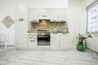 A kitchen or kitchenette at A Due Passi Da Toledo