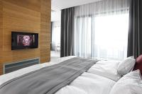 Łóżko lub łóżka w pokoju w obiekcie Wellness Hotel ABÁCIE
