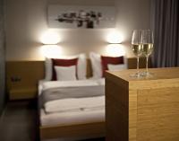 Łóżko lub łóżka w pokoju w obiekcie Wellness Hotel ABÁCIE
