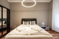 Posteľ alebo postele v izbe v ubytovaní Budapest Lighthouse Apartment