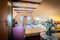Postel nebo postele na pokoji v ubytování Hotel Sluníčko