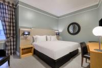 Posteľ alebo postele v izbe v ubytovaní Hotel Larios Málaga