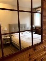 Łóżko lub łóżka w pokoju w obiekcie Apartment Bourg St Maurice