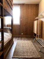 Łóżko lub łóżka w pokoju w obiekcie Apartment Bourg St Maurice