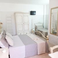 A bed or beds in a room at Agriturismo La Rondine