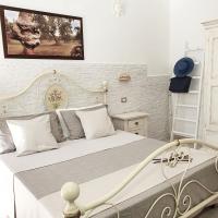 A bed or beds in a room at Agriturismo La Rondine