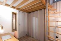 Łóżko lub łóżka w pokoju w obiekcie Appartement lumineux en centre-ville