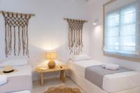 Postel nebo postele na pokoji v ubytování La Mer Residences