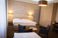 Postel nebo postele na pokoji v ubytování Hotel Freud