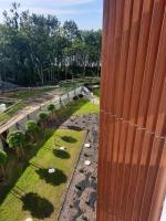 Ogród w obiekcie Apartament Pełen Słońca - Pinea Pobierowo