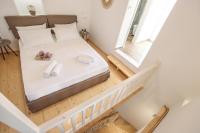 Postel nebo postele na pokoji v ubytování Whitelist Maisonette I and II in Mykonos Town