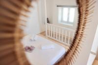 Postel nebo postele na pokoji v ubytování Whitelist Maisonette I and II in Mykonos Town