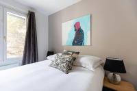 Łóżko lub łóżka w pokoju w obiekcie EasyLodge - Appartement 2 chambres Bordeaux