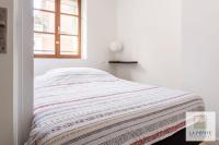 Posteľ alebo postele v izbe v ubytovaní Residence Bastin