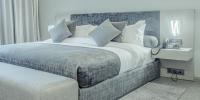 Makass Appart Hotelにあるベッド