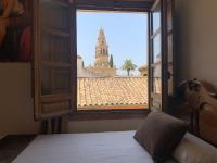 Posteľ alebo postele v izbe v ubytovaní Hotel Casa Museo de la Mezquita