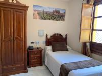 Posteľ alebo postele v izbe v ubytovaní Hotel Casa Museo de la Mezquita
