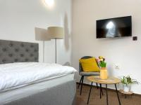 Postel nebo postele na pokoji v ubytování Hotel COLCHI