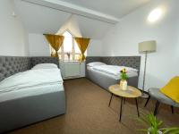 Postel nebo postele na pokoji v ubytování Hotel COLCHI