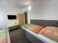 Postel nebo postele na pokoji v ubytování Hotel COLCHI