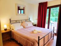 A bed or beds in a room at La Sorgente