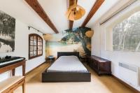 Łóżko lub łóżka w pokoju w obiekcie Mas Frederi - Maison avec piscine pour 10