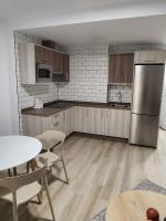 Kuchyň nebo kuchyňský kout v ubytování Apartamentos Doña Emilia