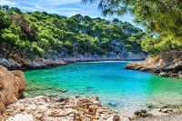 a river with blue water and trees in the background at Chill Out Cabanon Coeur Calanques in Marseille