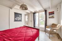 Posedenie v ubytovaní Maison avec jardin à 200m de la plage La Cantine