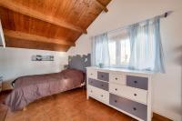 Posteľ alebo postele v izbe v ubytovaní Maison avec jardin à 200m de la plage La Cantine