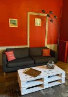a living room with a couch and a coffee table at L&#39;Estanquet Bed and Breakfast pdj offert in Gastes