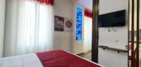 A television and/or entertainment centre at Vatican Apartment St. Peter