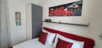 A bed or beds in a room at Vatican Apartment St. Peter