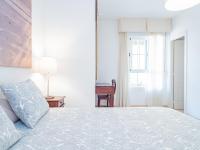 A bed or beds in a room at Cubo's Beach & Golf Marbella