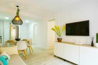 A television and/or entertainment centre at Apartamento Pink Arena