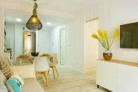 A television and/or entertainment centre at Apartamento Pink Arena