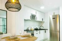 A kitchen or kitchenette at Apartamento Pink Arena