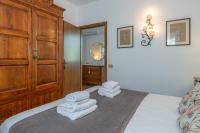 A bed or beds in a room at Swan Lake by Wonderful Italy
