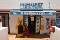 Supermarket nebo jiné obchody v  apartmánu nebo okolí