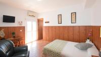 Posteľ alebo postele v izbe v ubytovaní Habitaciones Baleares