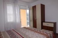 Postel nebo postele na pokoji v ubytování Apartments in Lotos Complex